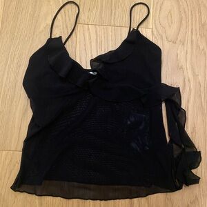 Cute Mesh top, breast area is covered (No mesh around that area).